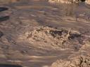 An early morning visit to bubbling mud pots, geysers and more.